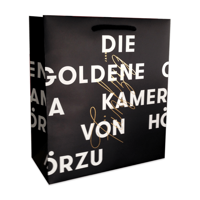 Schlichte elegante Werbetasche mit einer goldenen Prägung für eine Veranstaltung